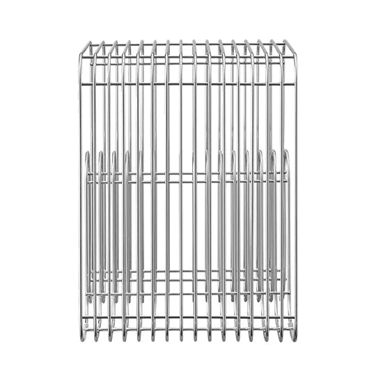 Brushed metal side table with built-in magazine rack placed next to neutral gray couch