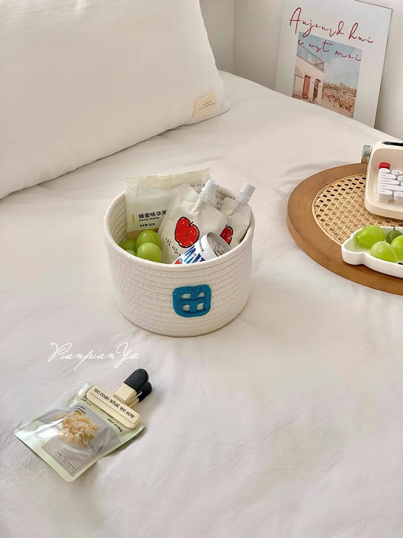 Cartoon-style organizer basket for storing small items and toys