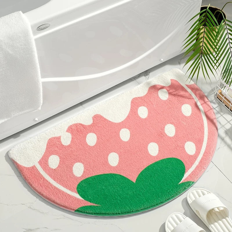 Cozy plush mat next to bathtub with cartoon print