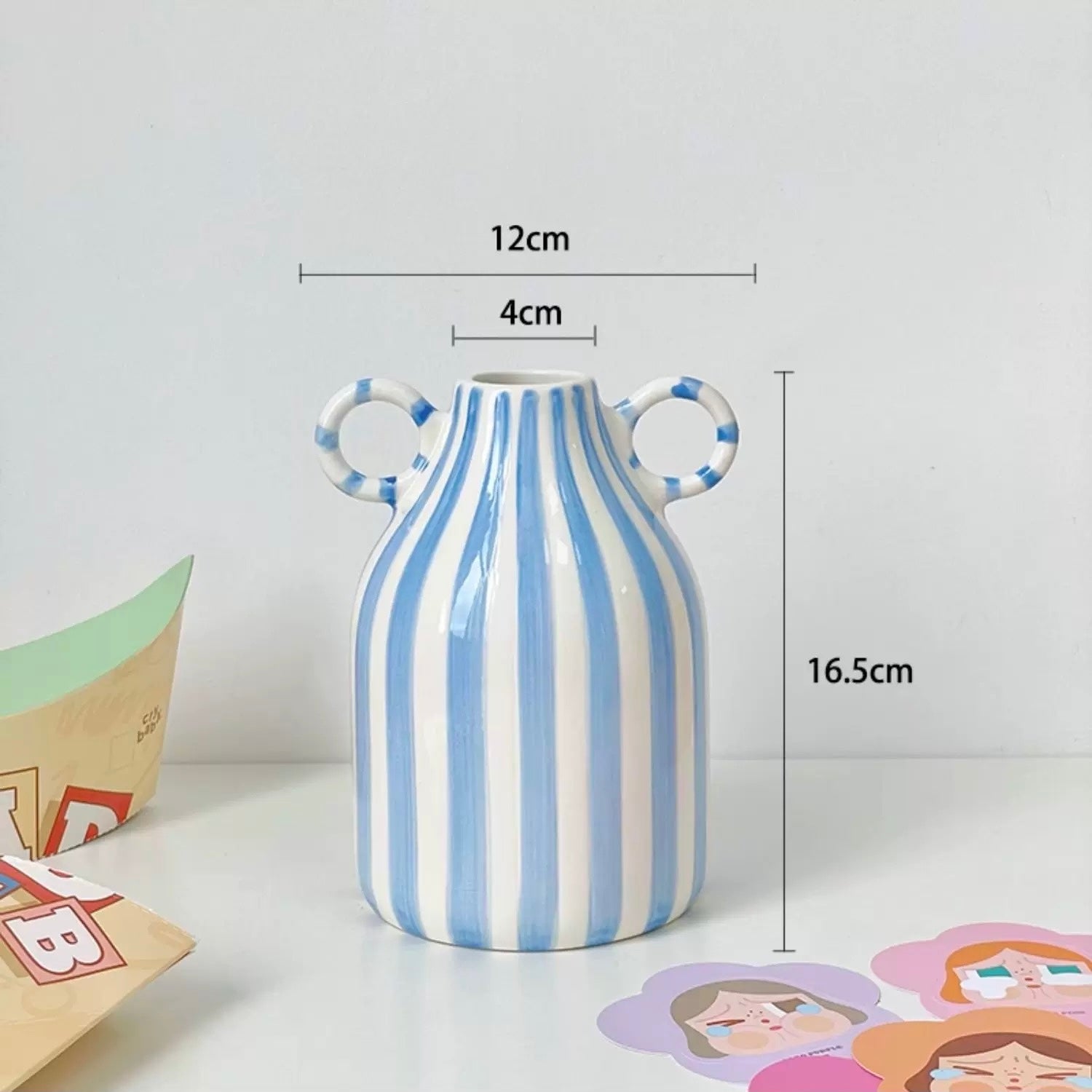 Aesthetic pottery vase with pastel glaze placed in Scandinavian room