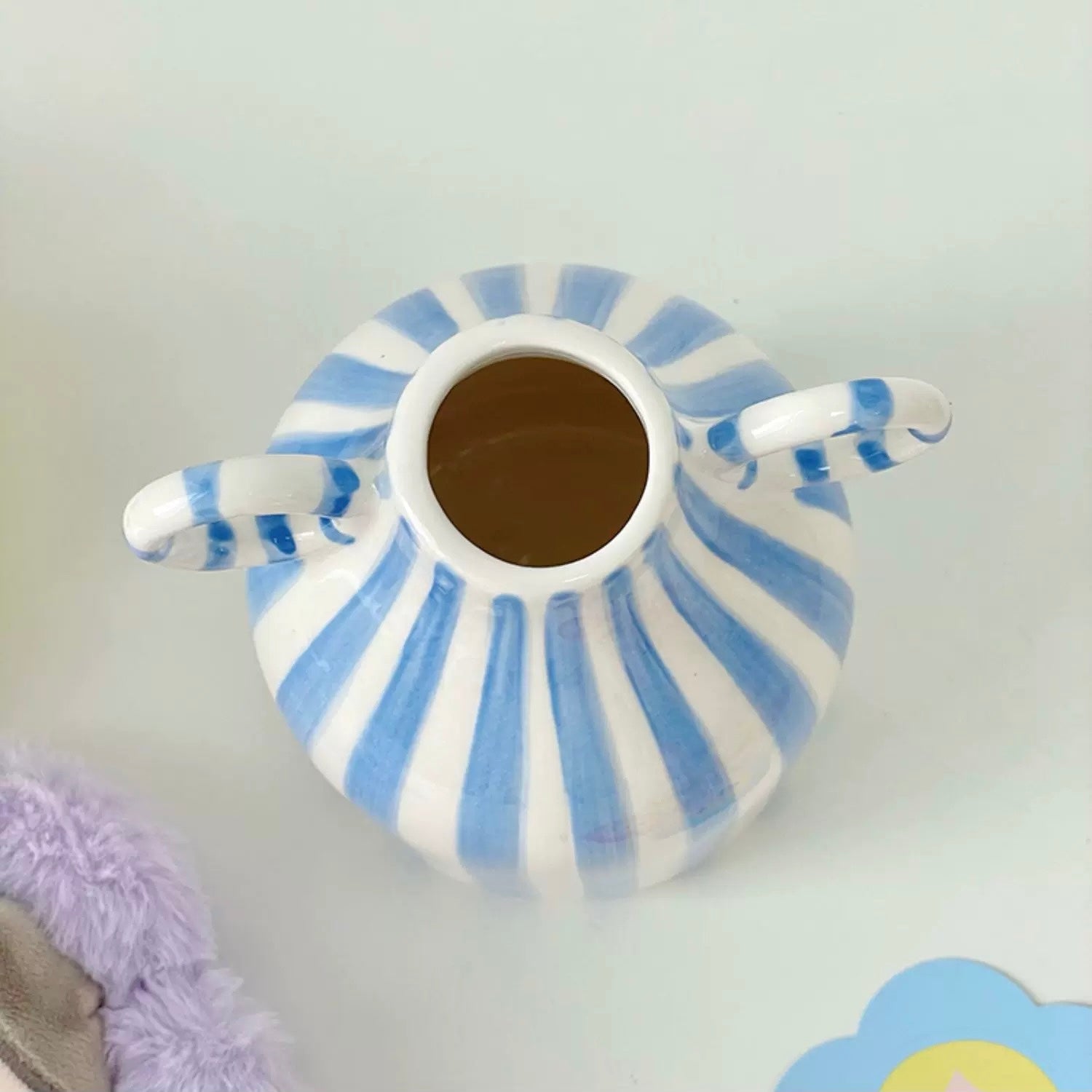 Nordic-style flower vase styled in coquette room corner