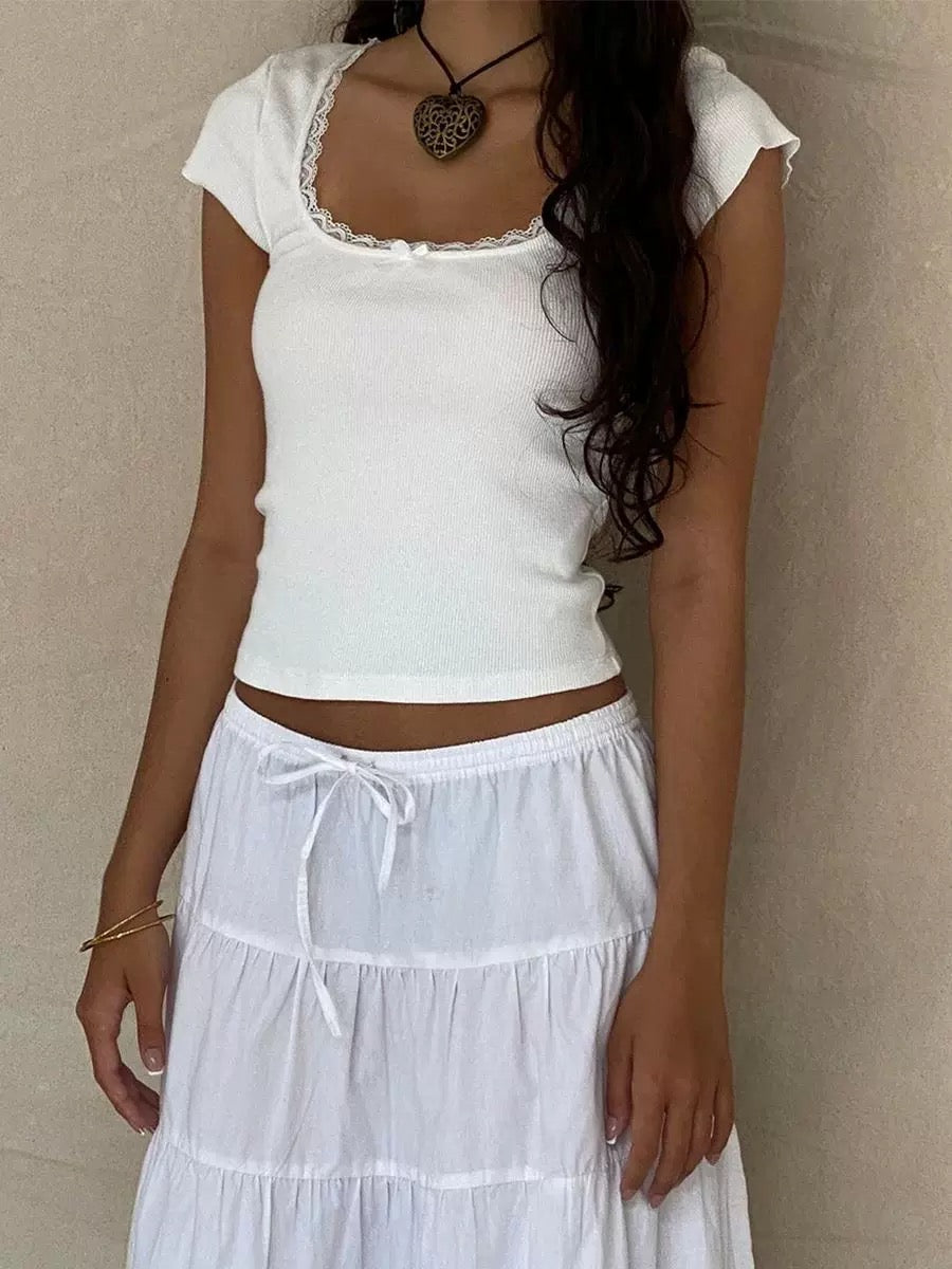 Cottagecore lace trim crop top in white. Square neck Y2K T-shirt with short sleeves for retro 2000s and milkmaid aesthetic.
