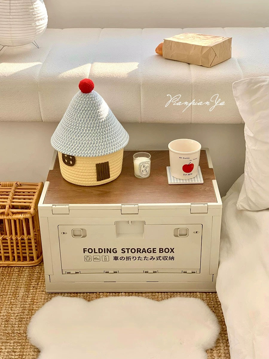 Adorable pastel rope storage basket shaped like a house with red roof
