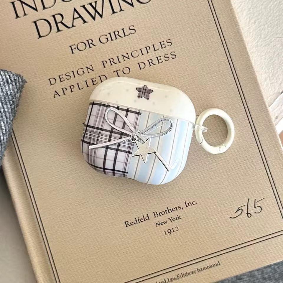 Plaid patterned case with star design on a pink background