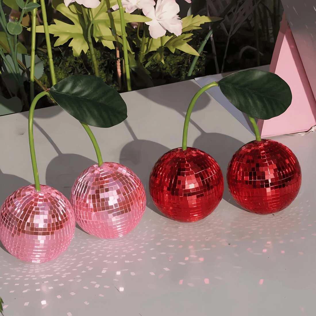 Dorm desk decor featuring cherry disco balls