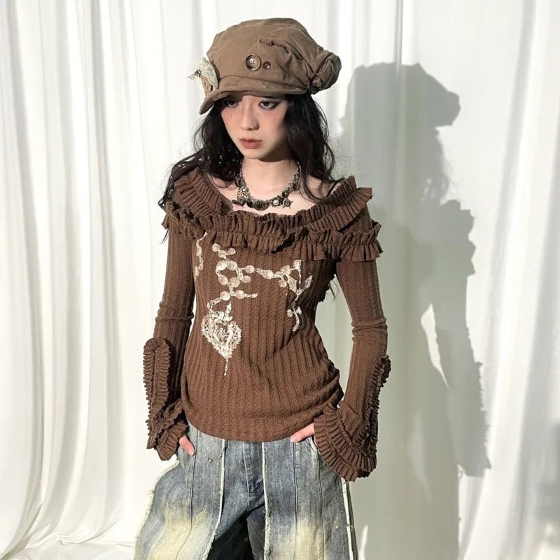 Y2K grunge sweater with off-shoulder slash neck and flare sleeves. Gothic knitted crop top for women’s vintage aesthetic fashion.