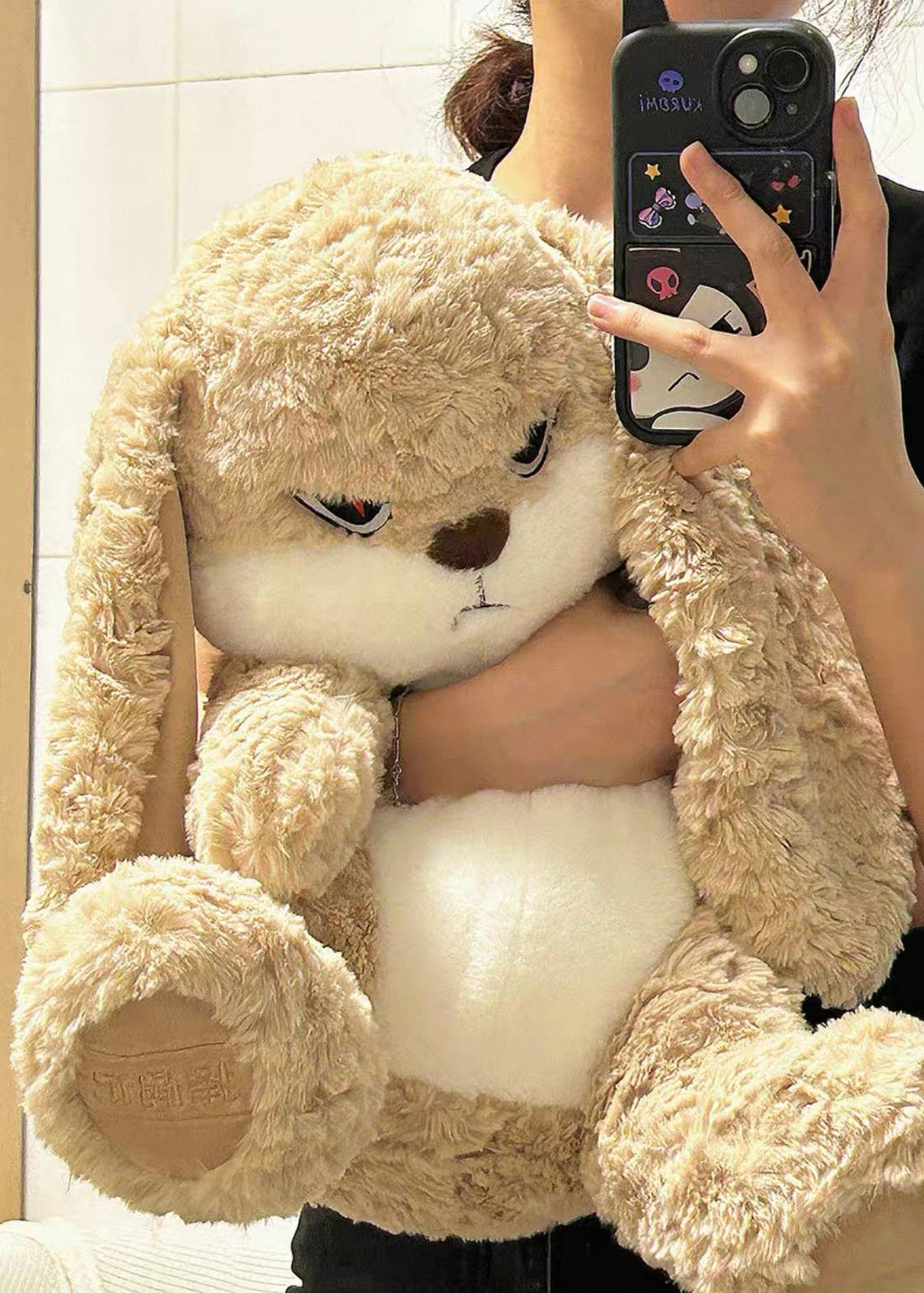 The Angry Rabbit Plush Toy placed on a shelf as a decorative piece.