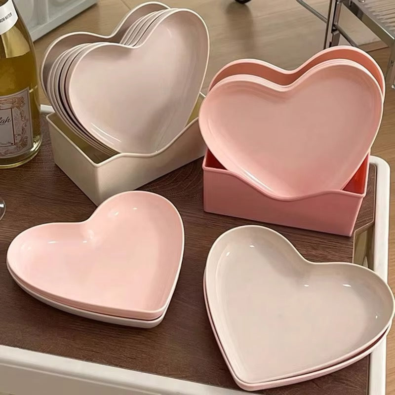 Love heart pink plastic plates for snacks and dessert