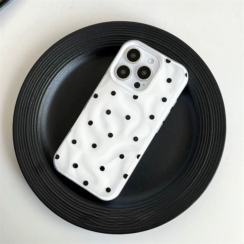 Full-body dotted case with ultra-reflective finish and dot vibes
