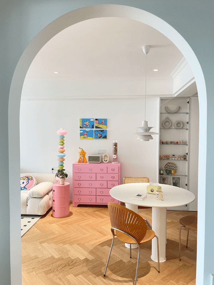Modern round nightstand with multi-tier storage in pink