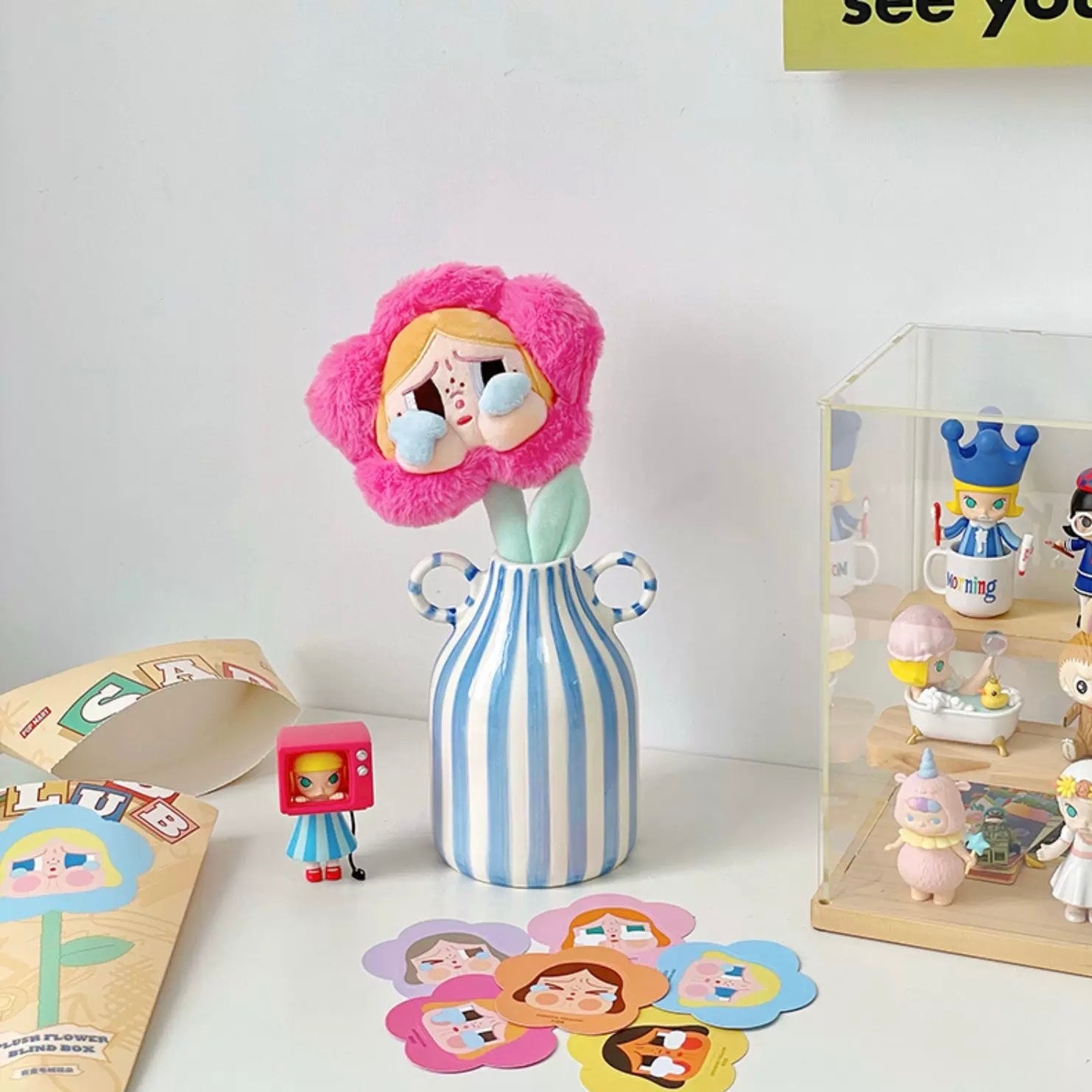 Unique dopamine vase with blue stripes and whimsical retro design