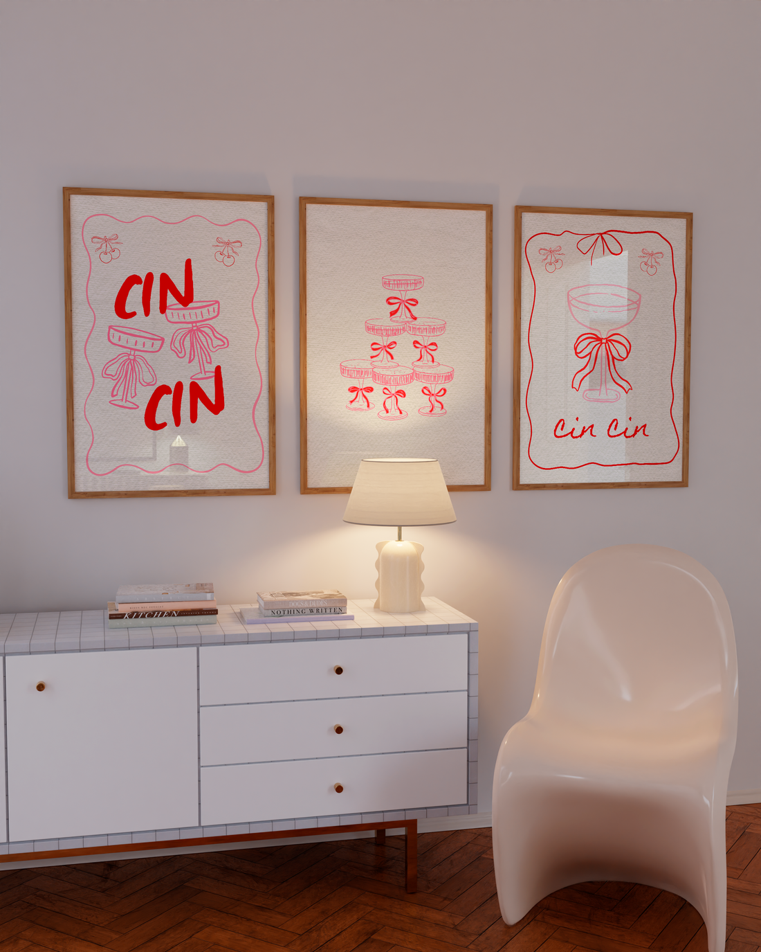 Retro pink 'Cin Cin' poster featuring martini glasses and bows, perfect for bar cart wall decor