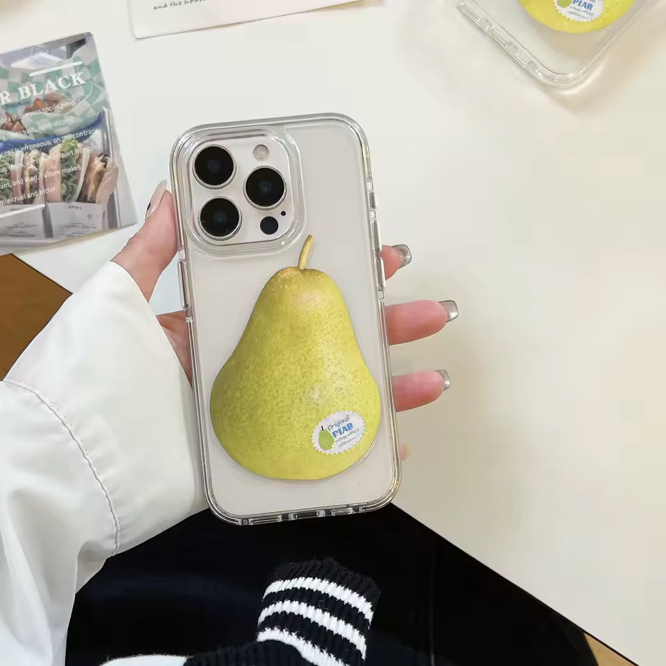 Phone cases with pear design on a table with a striped cloth in the background