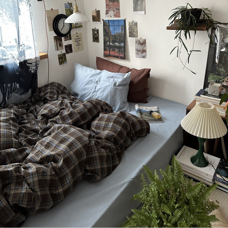 Blue and brown plaid bedding with denim blue and mocha pillowcases