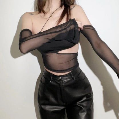 Black mesh crop top with asymmetrical design, perfect for edgy and rebellious looks.