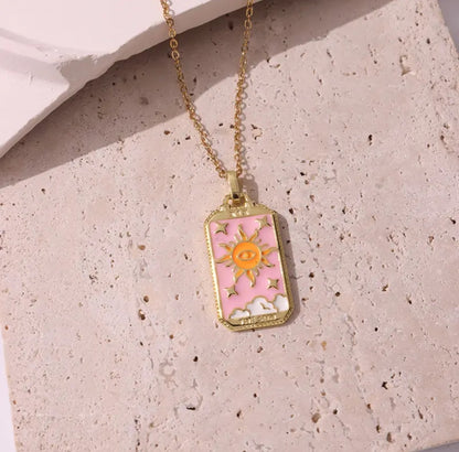 Enchanting pink tarot card jewelry, adding a mystical vibe to your look.