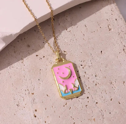Pink tarot card pendant on a delicate chain, a symbol of intuition and spirituality.