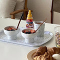 Chic ceramic bowl with a vintage flair, enhancing your table setting with retro vibes.