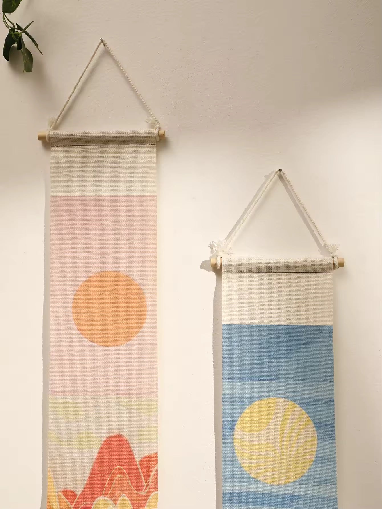 Minimalist boho tapestry hanging with soft tones and cotton fringe