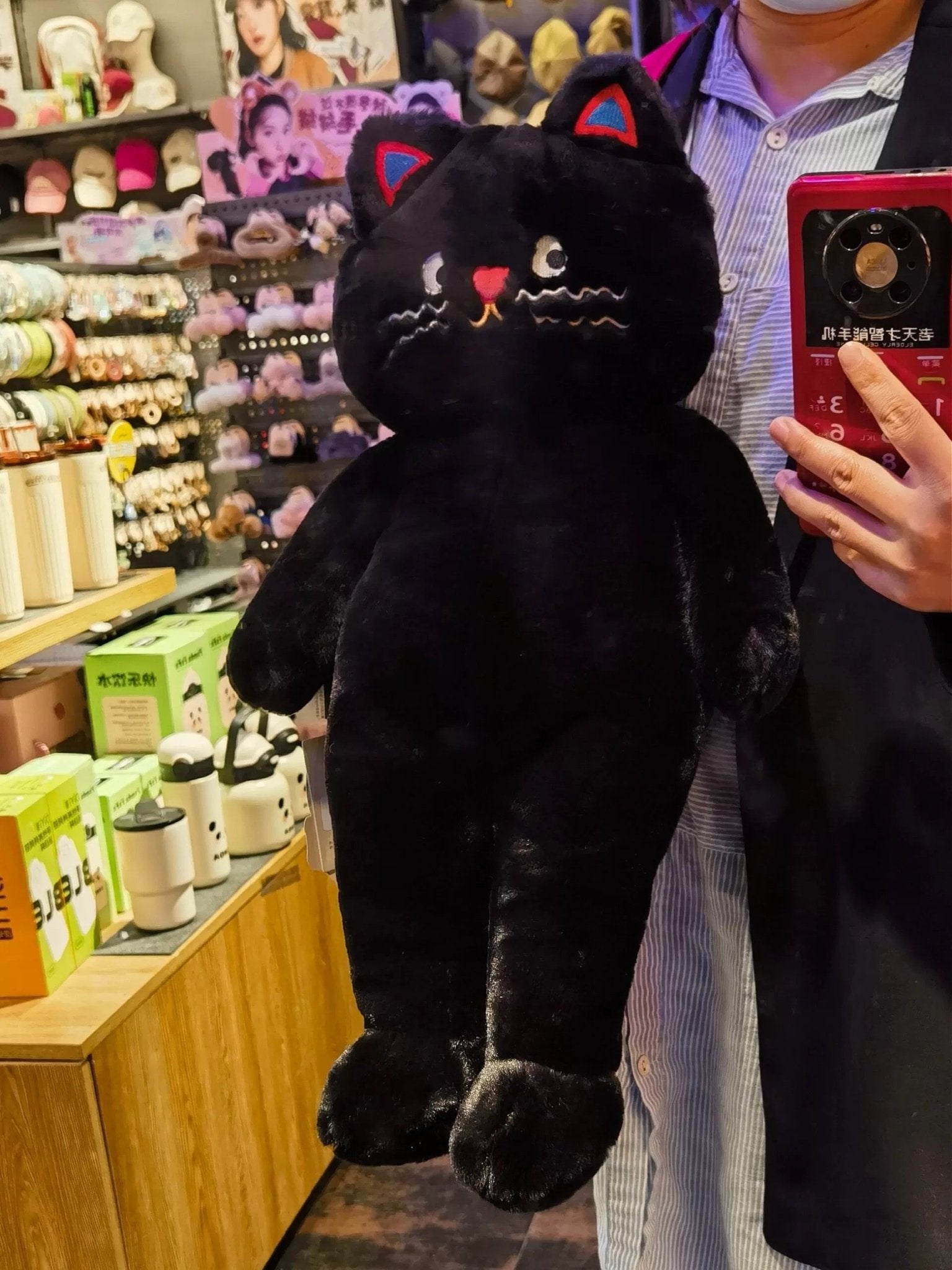 Cozy pink cat pillow for an aesthetic bedroom vibe