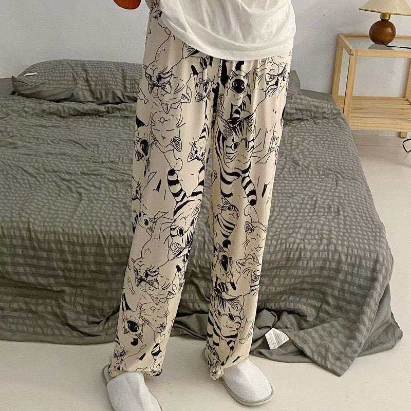 Cute cartoon cat pajama pants for women with loose wide-leg design and casual style