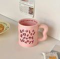 Aesthetic pink and yellow ceramic mugs for cute decor