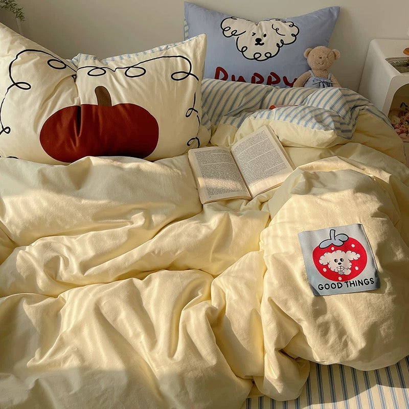 Cute preppy bedding set featuring a bakery pillow and striped sheets