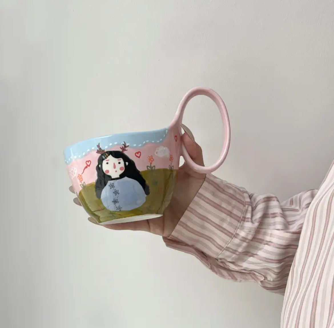 Aesthetic mug gift ideas featuring girl painting design, perfect for housewarming gifts.