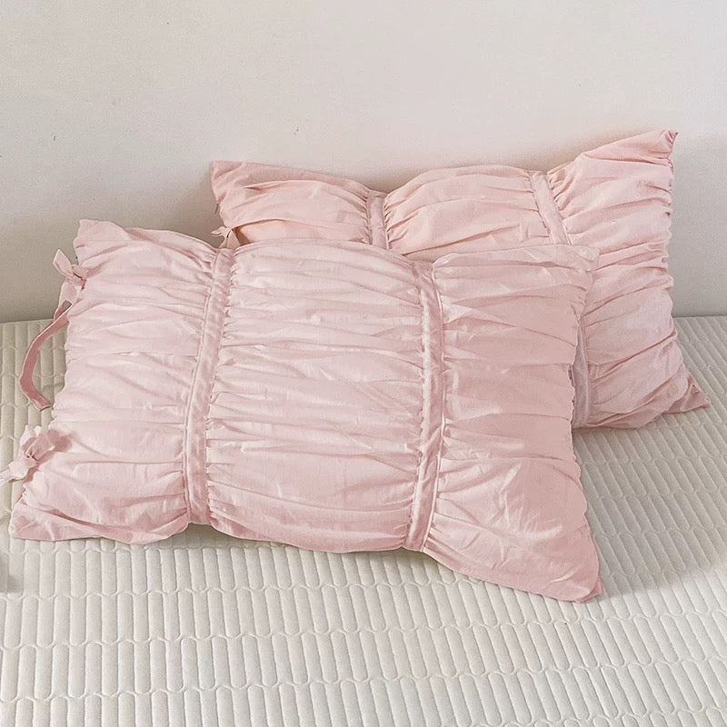Ruched pleated pillowcase in cotton, versatile design for pastel and cottagecore rooms.