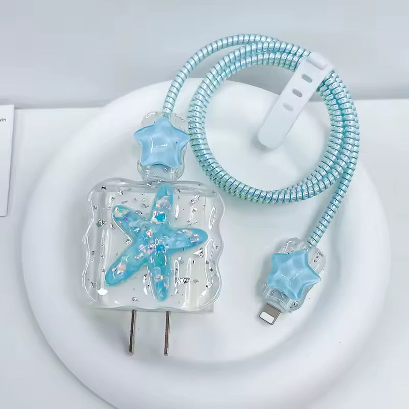 Blue starfish-themed USB cable on a white background