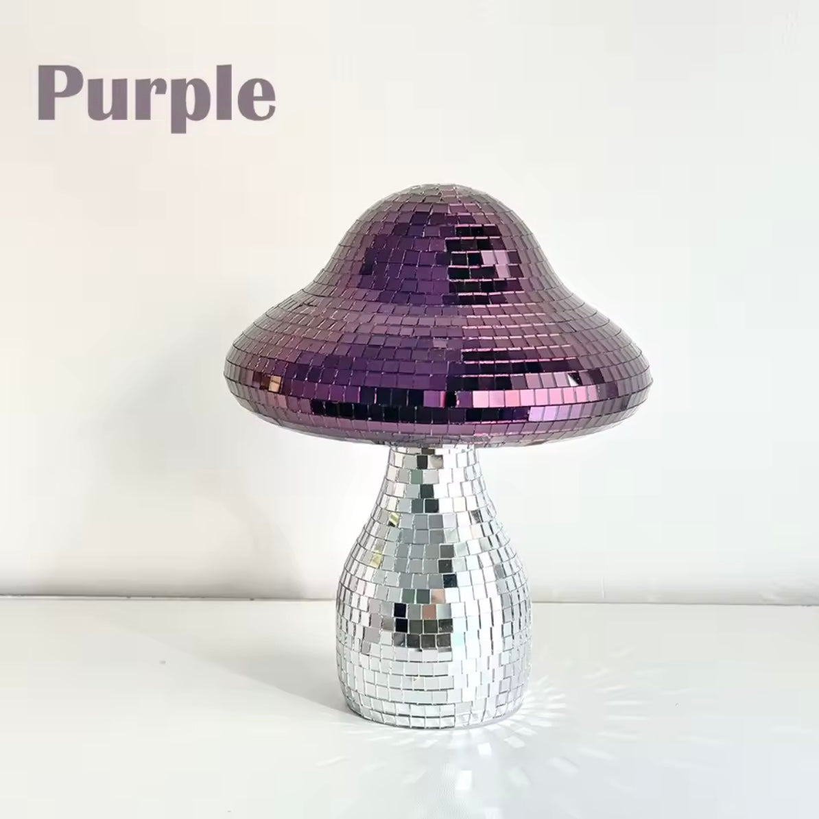 Bedroom vanity styled with mushroom disco and perfume bottles