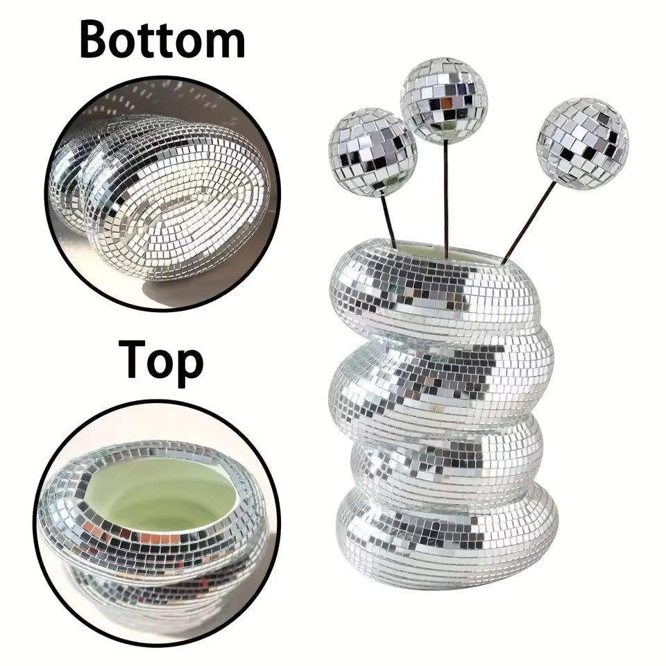 Silver disco ball with close-up insets showing top and bottom views on a white background