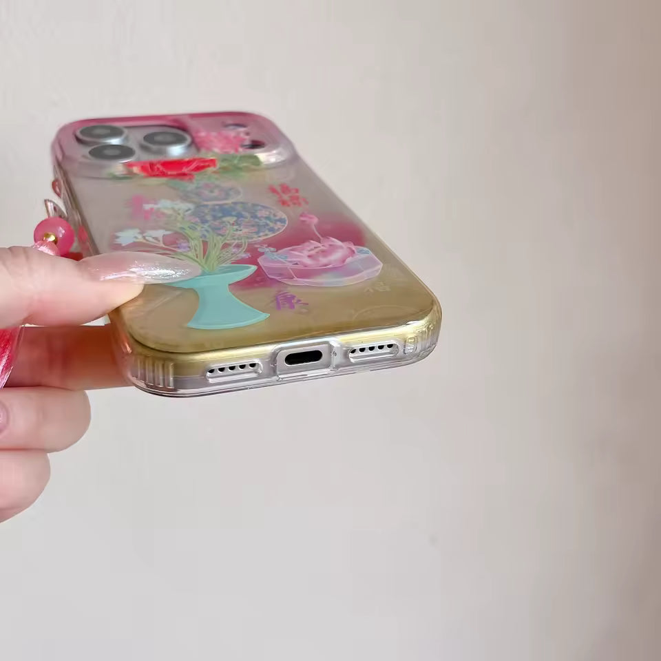 Asian aesthetic silicone iPhone case featuring lotus flowers peonies translucent finish and pink tassel accessory