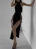 Black goth dress with bandage design, ideal for cocktail and evening events