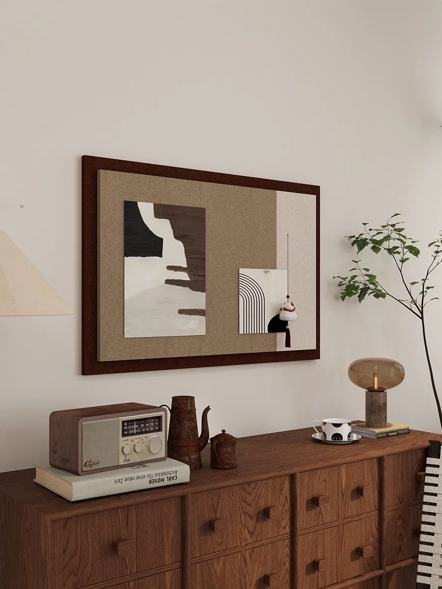 Bauhaus pin board display in brown and cream styled over a dresser