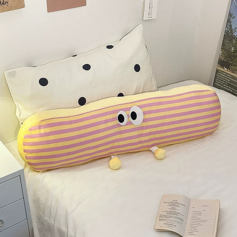 Long throw pillow with eyes, perfect for kids' rooms