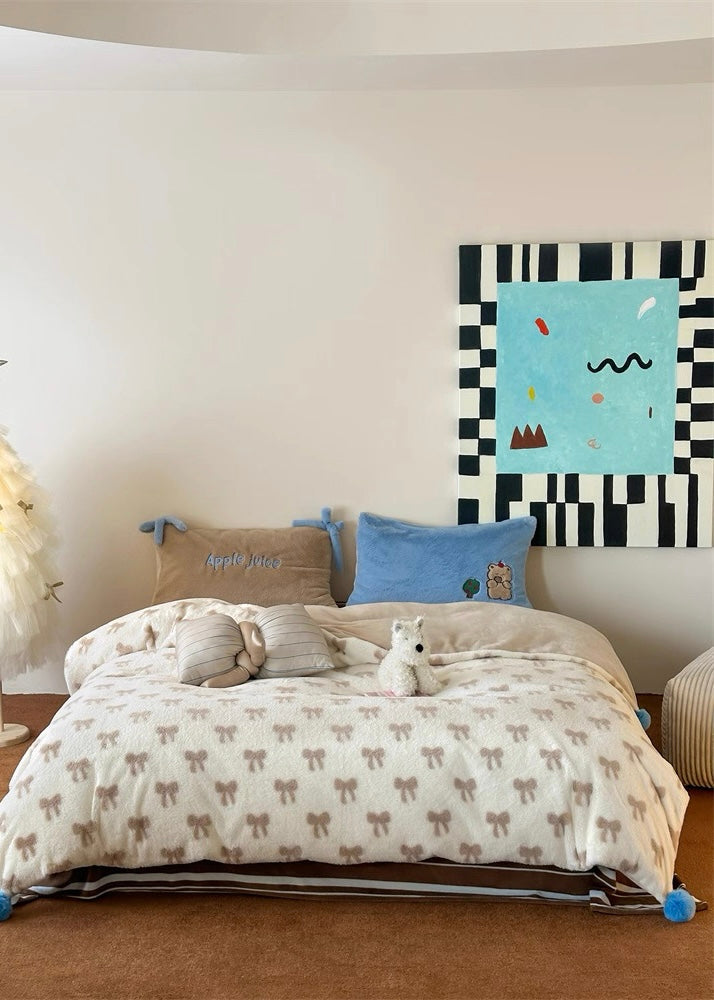 Children's bedroom with a bed, pillows, and a colorful abstract painting on the wall.