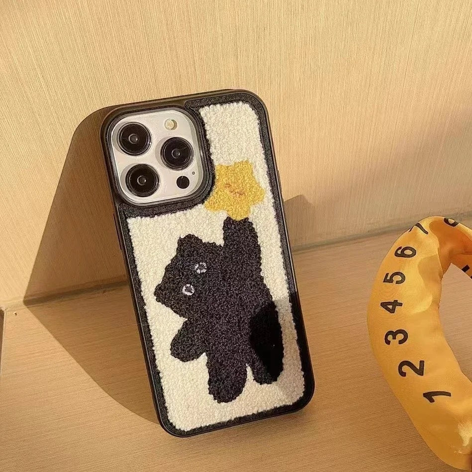 Winter cozy plush iPhone case with cartoon design