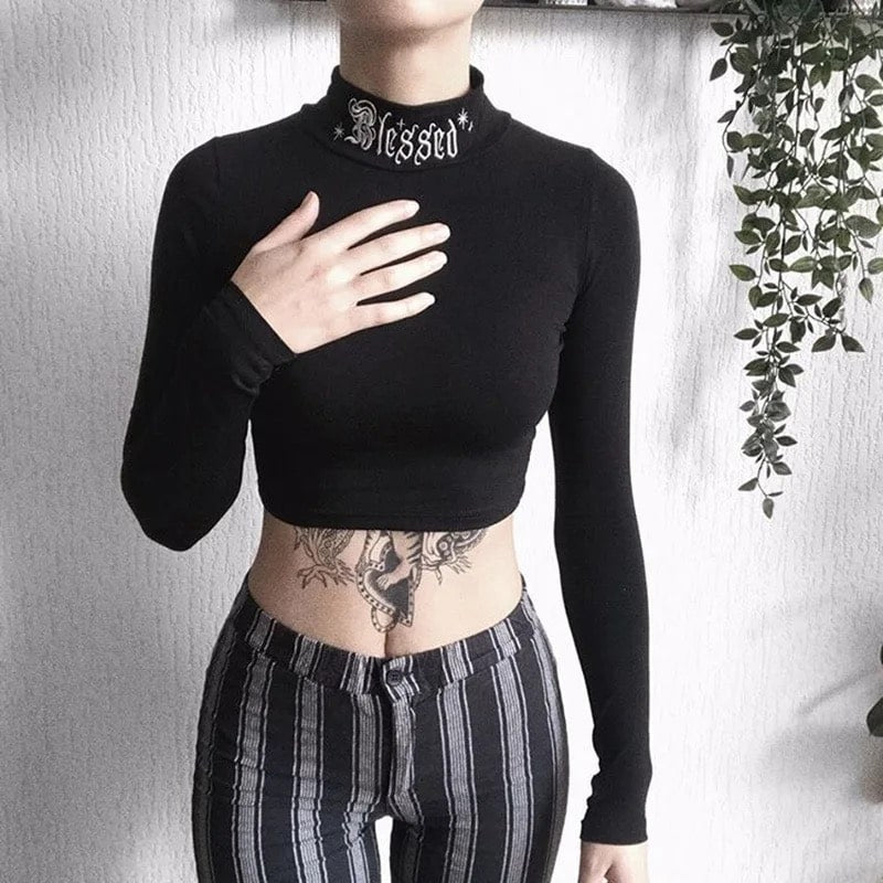 Gothic black long sleeve crop top with Harajuku letter embroidery. Stylish turtleneck top for e-girl fashion and casual outings.