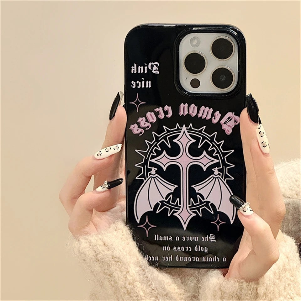 Y2K grunge black and pink iPhone case with gothic cross and wing design. Stylish and protective cover for all iPhone models.