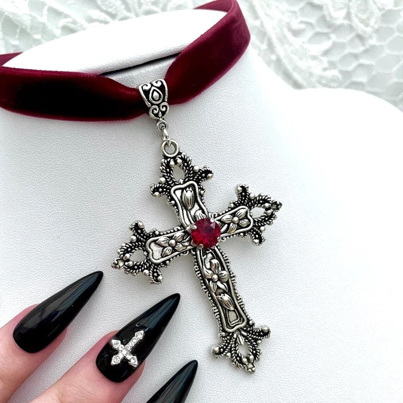 Velvet grunge choker necklace with Gothic cross pendant and bead design. Perfect for Halloween or party wear.