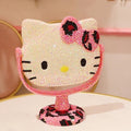 Y2K rhinestone mirror on white background – inspired by Hello Kitty