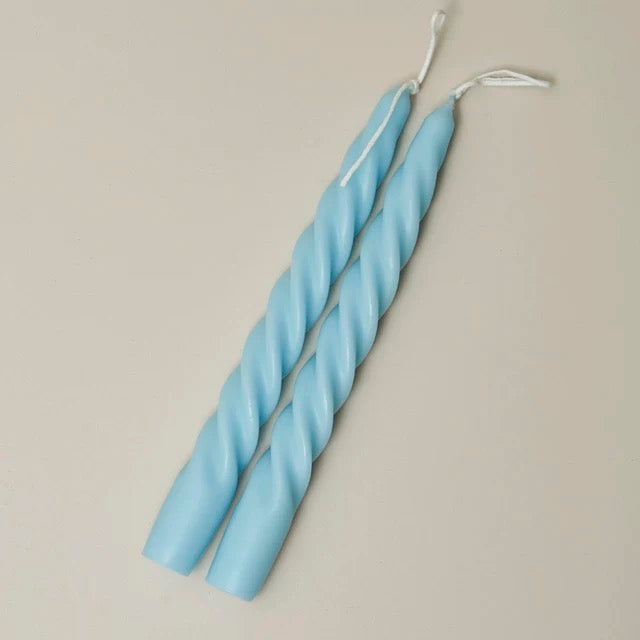 Set of blue pastel spiral candles for aesthetic home settings