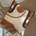 Embroidered boho pillow cover, adding a cozy accent to any room