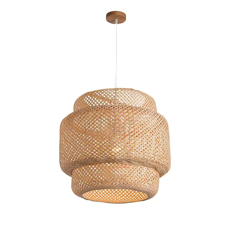 Boho bamboo rattan hanging lamp in airy white living room.