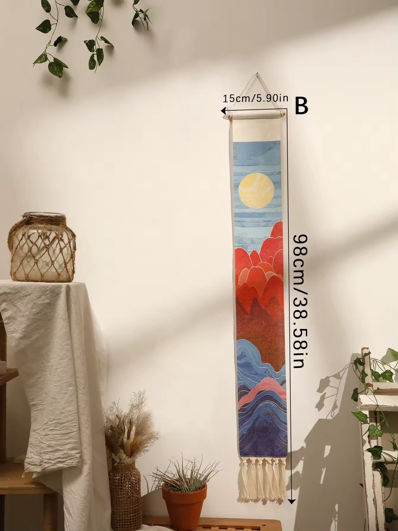 Boho studio wall decorated with layered linen mountain tapestries