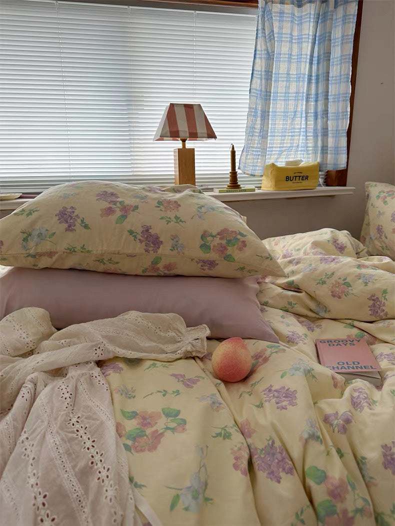 French country inspired floral cotton bedding designed with delicate blooms and warm butter yellow background beautifully