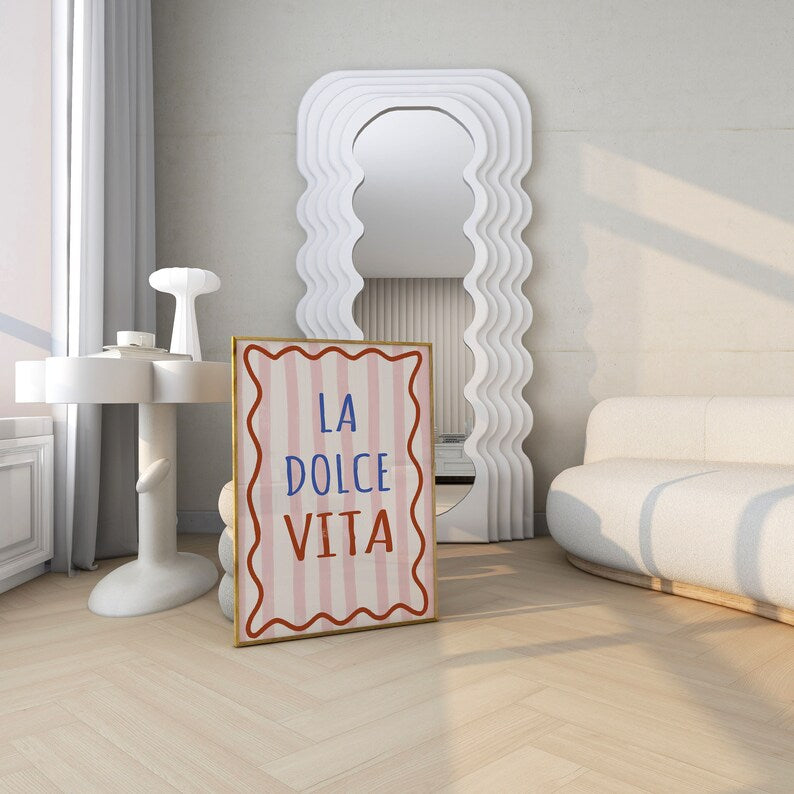 The poster hung above a bed, contributing to a cozy and stylish bedroom atmosphere.