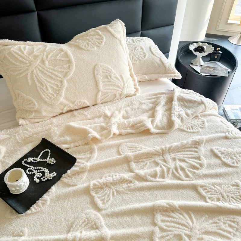 Elegant gift-ready throw with butterfly texture

