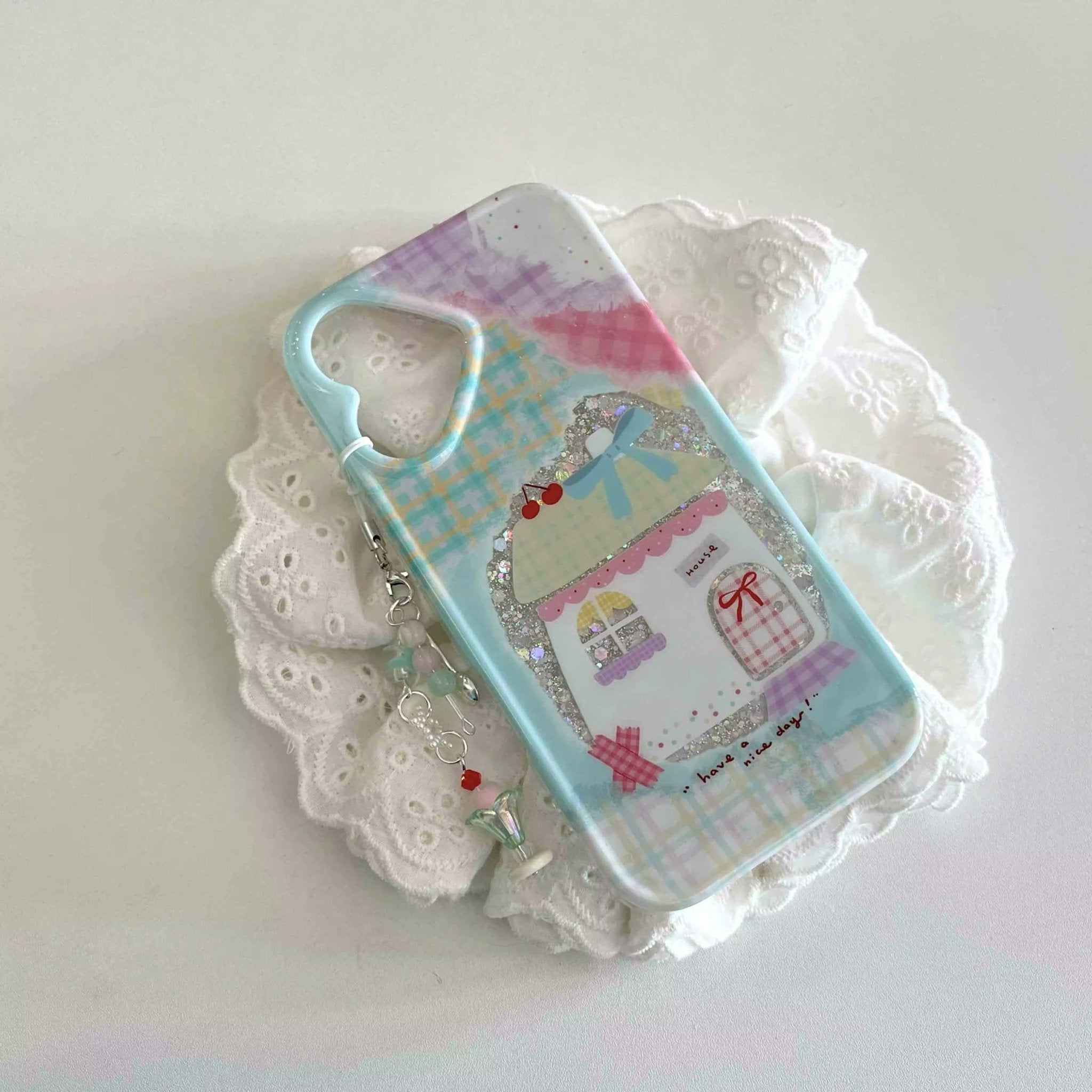 Front view of the Cartoon House Kawaii iPhone Case showcasing the pastel grid design and cartoon house motif